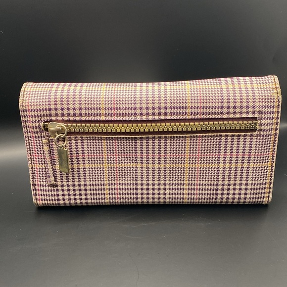 Super cute ladies wallet. All zippers and closures work as they should. - Picture 6 of 12